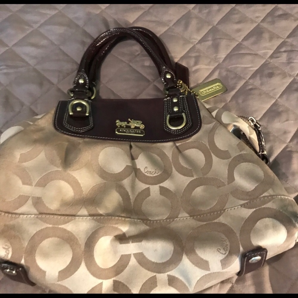 A pre owned coach handbag.